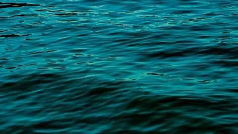 4K Slow Motion Video of Calming Ocean Waves and Reflective Water Surface Stock Footage 315876235