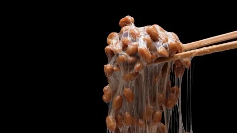 4K slow motion video to check the consistency of natto. Stock Footage 269856872