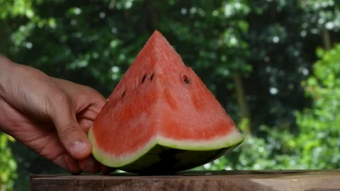 4K slow motion video of cutting a watermelon. Stock Footage 270692116