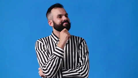 4k slow motion video of a man thinking about something over blue background. Stock Footage 228401281