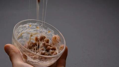 4K slow motion video with NATTO mixed in. Stock Footage 227304529
