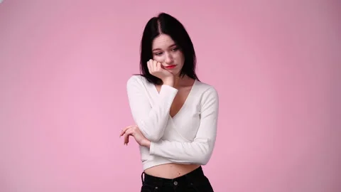 4k slow motion video of one girl yawning over pink background. Stock Footage 228719546