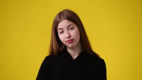 4k slow motion video of one girl with negative facial expression. Stock Footage 230275815