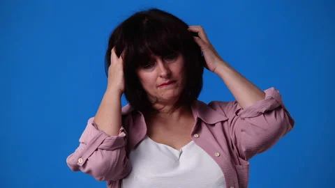 4k slow motion video of one woman doing head massage. Stock Footage 231331607