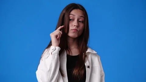 4k slow motion video of one girl thinking about something with a pen in hand. Stock Footage 231336131
