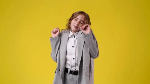 4k slow motion video of one girl dancing over yellow background. Stock Footage 234333349