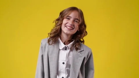 4k slow motion video of one girl posing for a video over blue background. Stock Footage 234452775