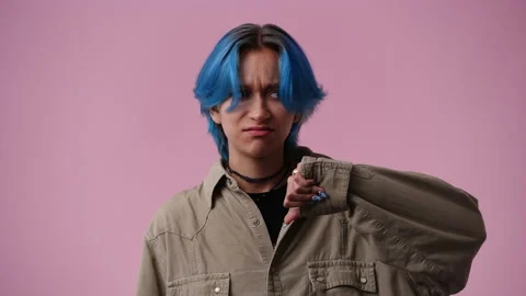 4k slow motion video of one girl with negative facial expression showing thumb Stock Footage 237706602