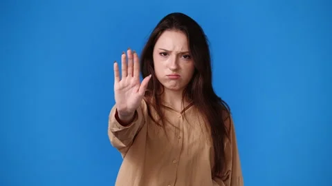 4k slow motion video of one girl which stopping and responds negatively to Stock Footage 237752452