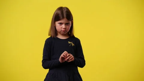 4k slow motion video of one kid posing and dreams of something over yellow Stock Footage 238519103