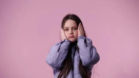 4k slow motion video of one child who had a negative reaction over pink Stock Footage 243320715