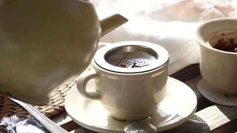 4K slow motion video of pouring tea into a cup in Kathmandu, Nepal. Stock Footage 169915938