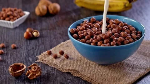 4K Slow Motion Video of Sweet Cocoa Chocolate Sugar Cereal Puffs Stock Footage 273607699