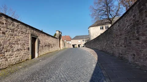4K Slow Motion Walk Along A Historic Cobblestone Street Video stock 333919987