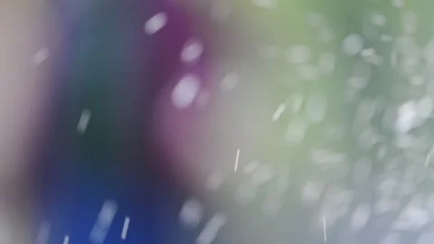 4K slow-motion of water droplets landing on a colorful, natural abstract Vídeo Stock 292676763