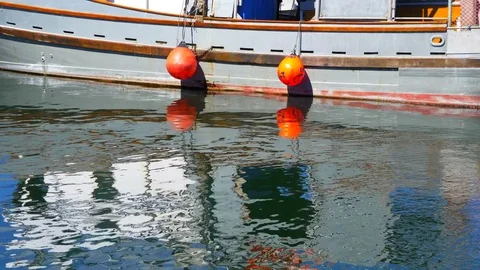 4K Slow Motion Water Reflection, Commercial Fishing Boat Bumper, Nautical Symbol Stock Footage 78233486