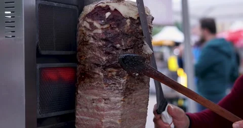 4K Slow Motion While Cutting Cooked Doner with Doner Knife 库存影片 246413641