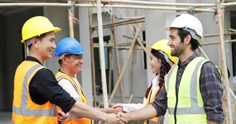 4K Slow side view . Civil engineer shakes hands Stock Footage 194765462