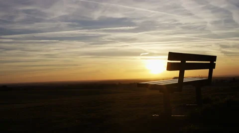 4K Slow zoom in on a bench at sunset Stock-Footage 62894148