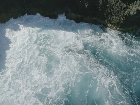 4k Slowmotion drone shot of powerful ocean waves crashing rocks in Tenerife Video stock 84048087