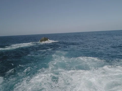 4k Slowmotion drone shot of powerful ocean waves crashing rocks in Tenerife Stock Footage 84169227