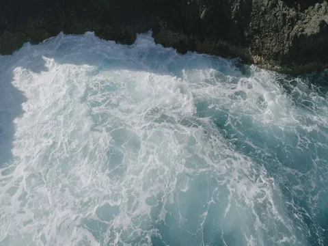 4k Slowmotion drone shot of powerful ocean waves crashing rocks in Tenerife Stock Footage 84190925