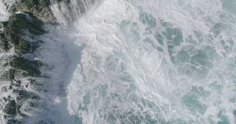 4k Slowmotion drone shot of powerful ocean waves crashing rocks in Tenerife 스톡 동영상 84191351