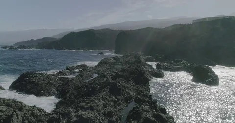4k Slowmotion drone shot of powerful ocean waves crashing rocks in Tenerife Stock Footage 84192280