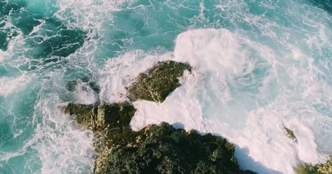 4k Slowmotion drone shot of powerful ocean waves crashing rocks in Tenerife Stock Footage 84192612