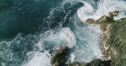 4k Slowmotion drone shot of powerful ocean waves crashing rocks in Tenerife Stock Footage 84193182