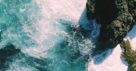 4k Slowmotion drone shot of powerful ocean waves crashing rocks in Tenerife Stock Footage 84193493