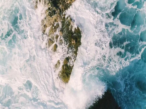 4k Slowmotion drone shot of powerful ocean waves crashing rocks in Tenerife Stock Footage 84194011