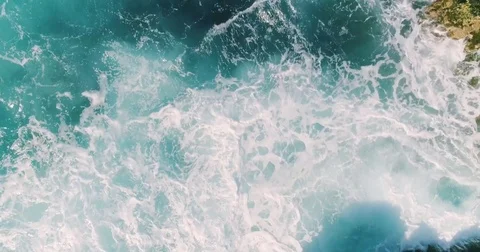 4k Slowmotion drone shot of powerful ocean waves crashing rocks in Tenerife Stock Footage 84194061