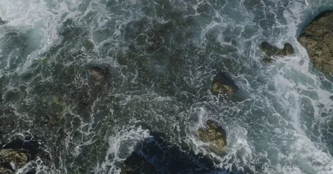 4k Slowmotion drone shot of powerful ocean waves crashing rocks in Tenerife Stock Footage 84194328