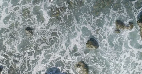 4k Slowmotion drone shot of powerful ocean waves crashing rocks in Tenerife Stock Footage 84194365