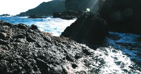 4k Slowmotion drone shot of powerful ocean waves crashing rocks in Tenerife Stock Footage 90272227