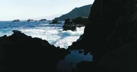 4k Slowmotion drone shot of powerful ocean waves crashing rocks in Tenerife 스톡 동영상 90272358