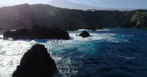 4k Slowmotion drone shot of powerful ocean waves crashing rocks in Tenerife 스톡 동영상 90272700