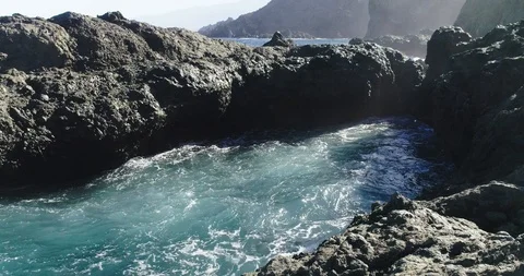 4k Slowmotion drone shot of powerful ocean waves crashing rocks in Tenerife 스톡 동영상 90272873
