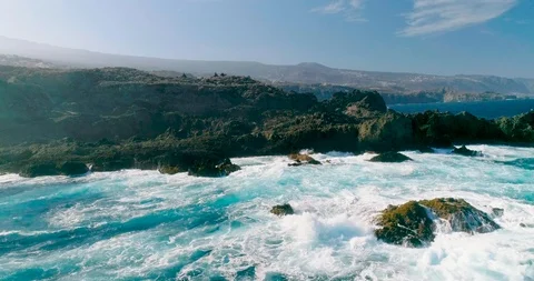 4k Slowmotion drone shot of powerful ocean waves crashing rocks in Tenerife 스톡 동영상 90283348