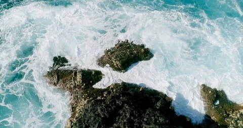 4k Slowmotion drone shot of powerful ocean waves crashing rocks in Tenerife Stock Footage 90288401