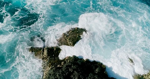 4k Slowmotion drone shot of powerful ocean waves crashing rocks in Tenerife Stock Footage 90289072