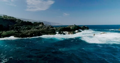 4k Slowmotion drone shot of powerful ocean waves crashing rocks in Tenerife 스톡 동영상 90291273