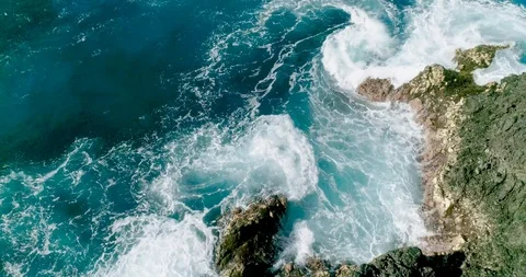 4k Slowmotion drone shot of powerful ocean waves crashing rocks in Tenerife Stock Footage 90291296