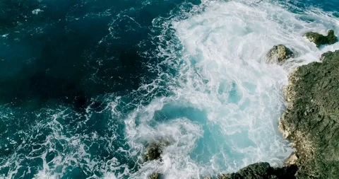 4k Slowmotion drone shot of powerful ocean waves crashing rocks in Tenerife Stock Footage 90291537