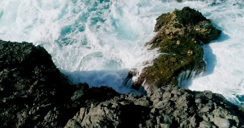 4k Slowmotion drone shot of powerful ocean waves crashing rocks in Tenerife Stock Footage 90291795