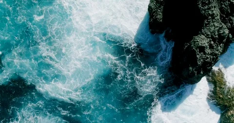 4k Slowmotion drone shot of powerful ocean waves crashing rocks in Tenerife Stock Footage 90292063