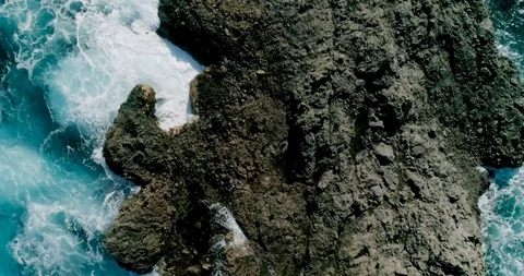 4k Slowmotion drone shot of powerful ocean waves crashing rocks in Tenerife Stock Footage 90292290