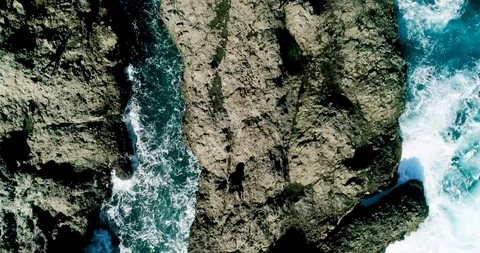 4k Slowmotion drone shot of powerful ocean waves crashing rocks in Tenerife Stock Footage 90293118