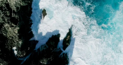 4k Slowmotion drone shot of powerful ocean waves crashing rocks in Tenerife Stock Footage 90293155